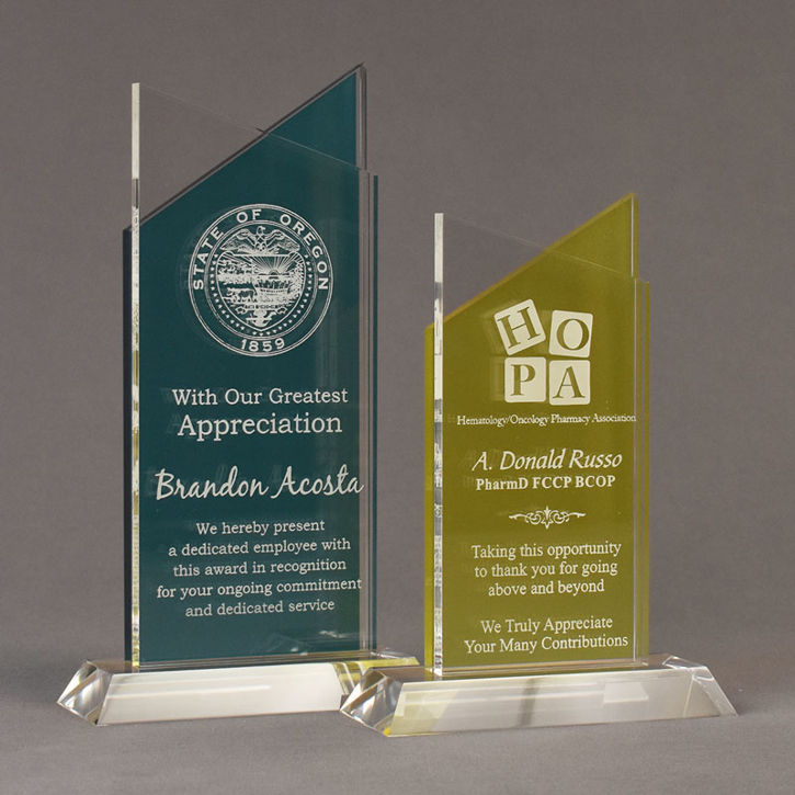 To colorful Lucent™ Candescent shaped acrylic trophy awards.